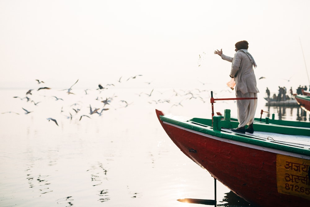 a man standing on a boat