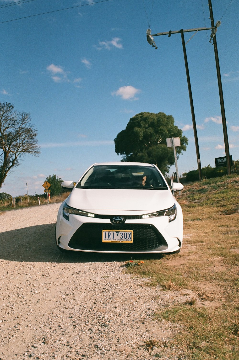 a white car on a road