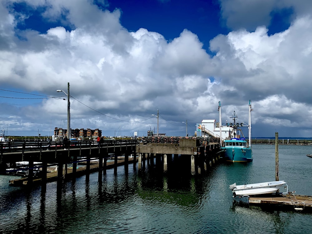 a boat is parked at a dock