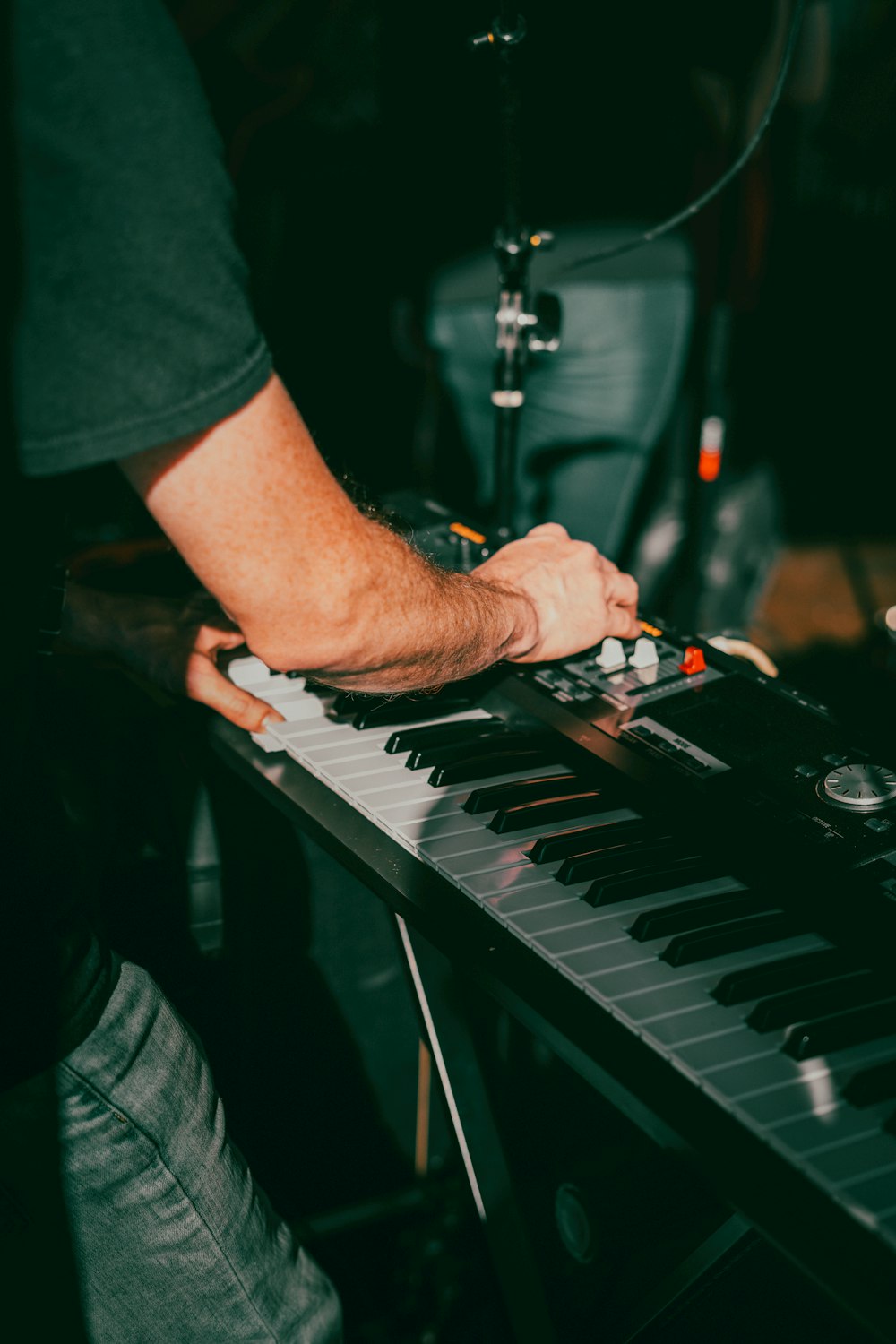 a person playing a keyboard