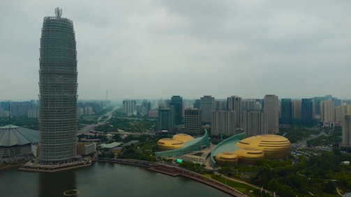 a city with a body of water and buildings