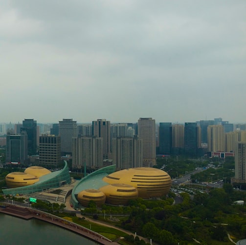 a city with a body of water and buildings