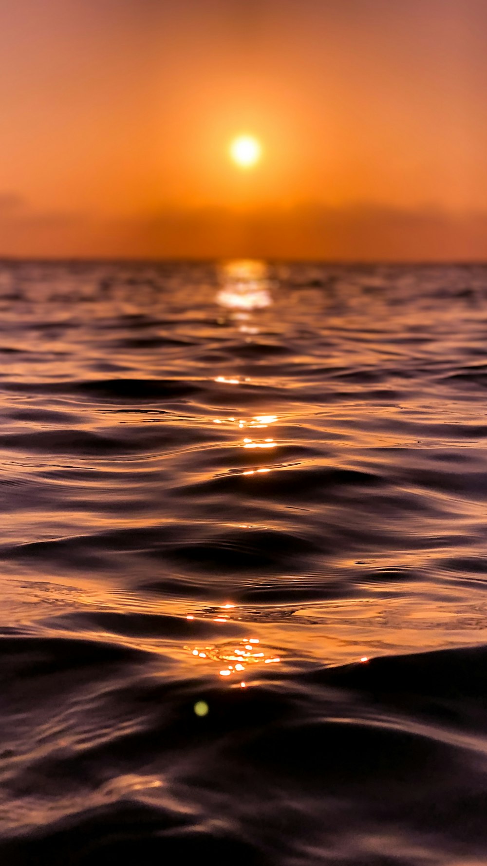 a sunset over the ocean