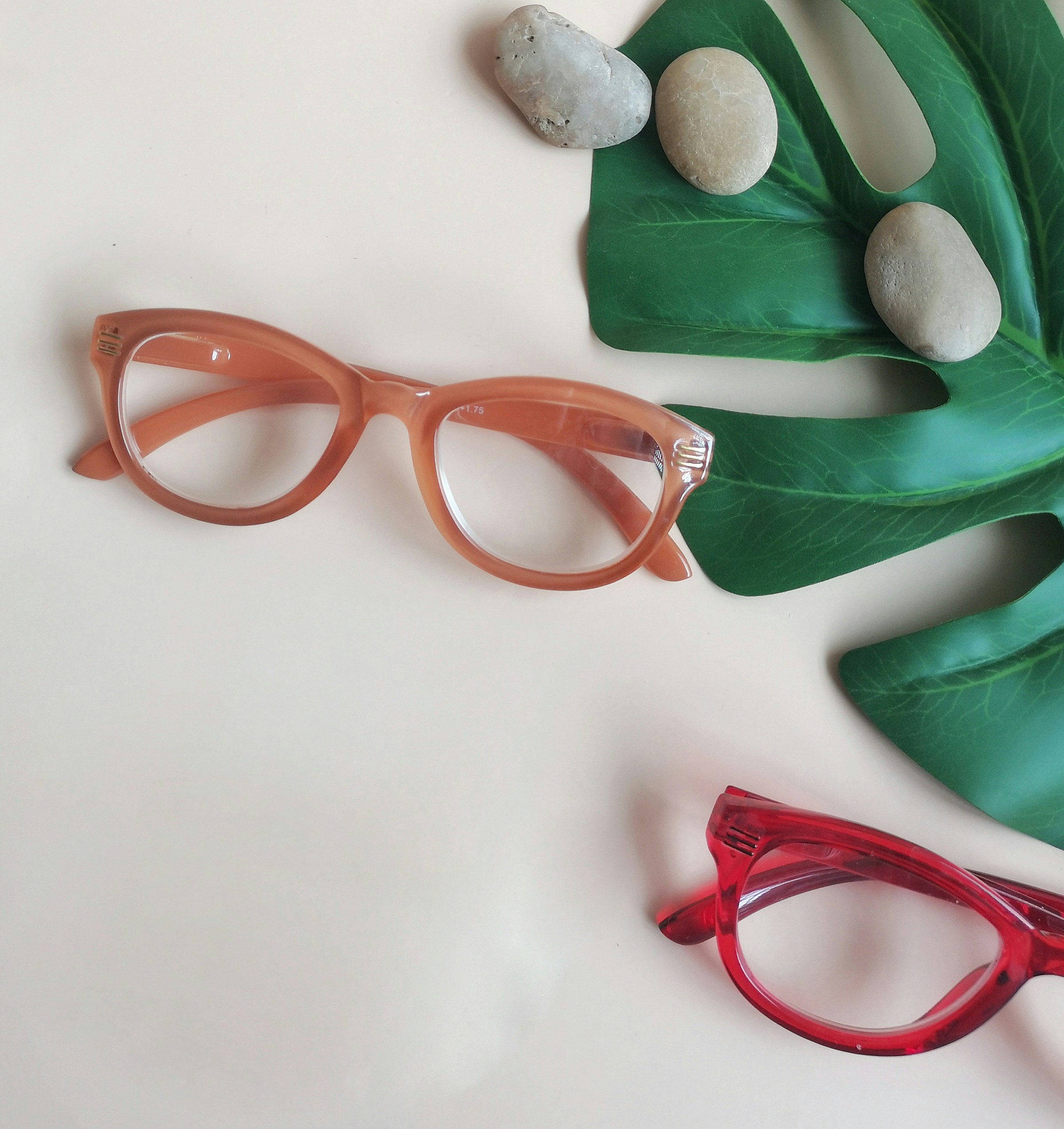 a pair of scissors and a pair of earrings