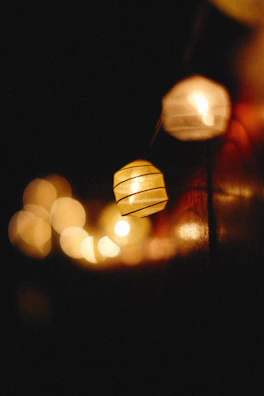 Soft-focus cinematic shot of honeycomb patterns illuminated by warm, golden light highlighting natural textures.