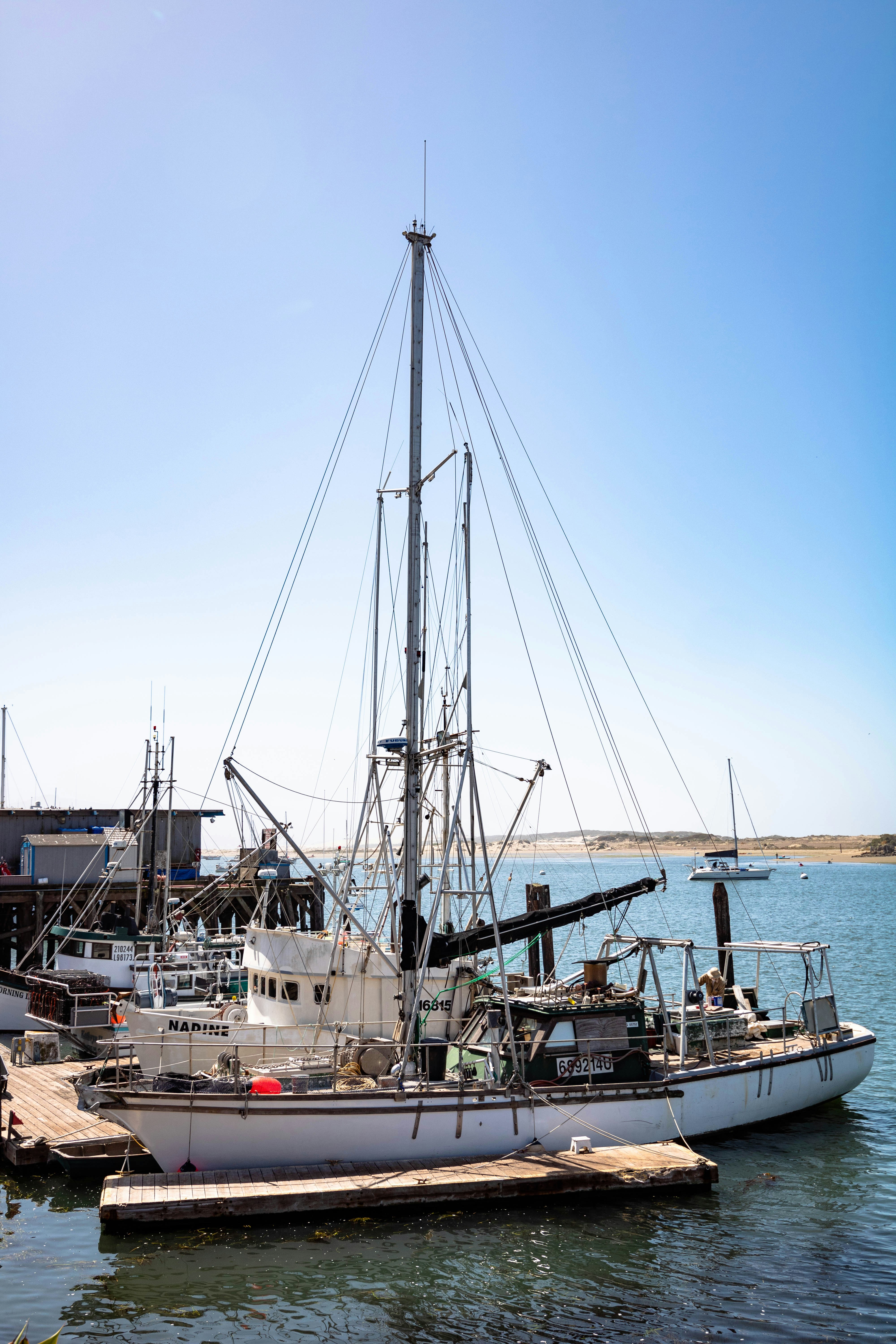 a boat docked at a pier