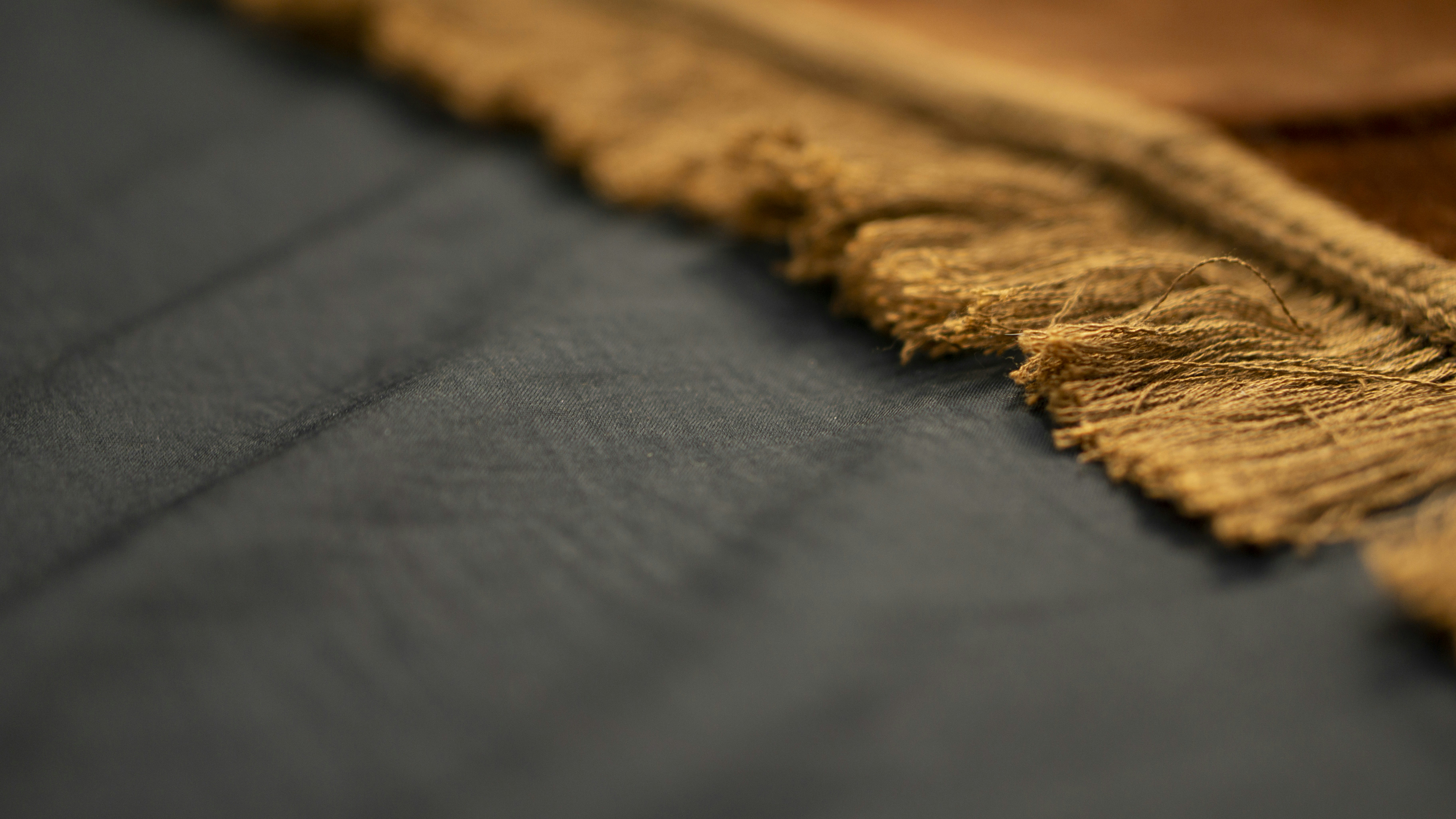 A moodboard with fabric swatches, sketches, and inspirational photos.