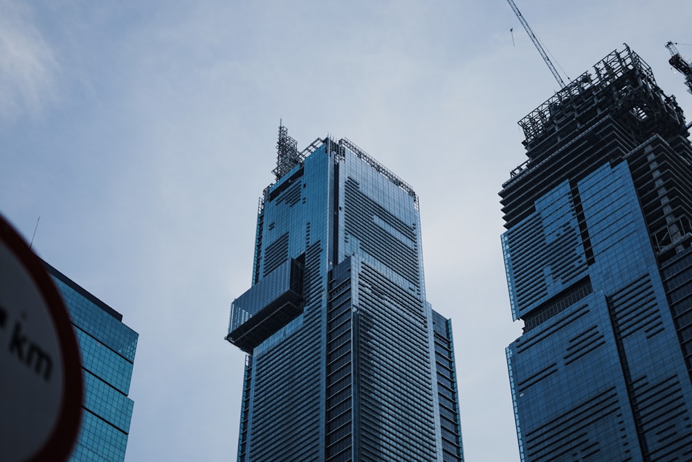 a few skyscrapers with a blue sky