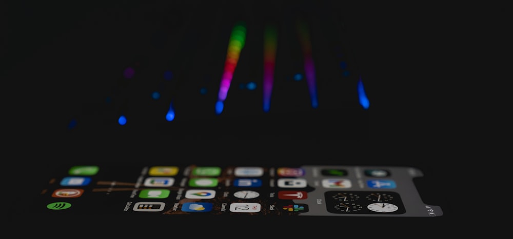 a remote control with colorful lights