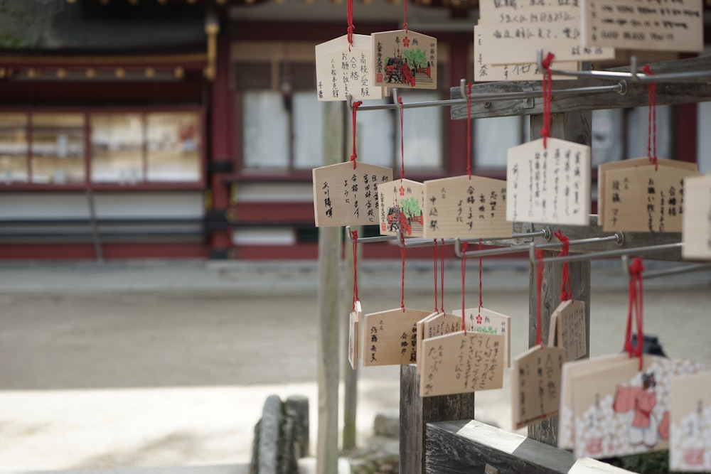 a group of signs on a pole