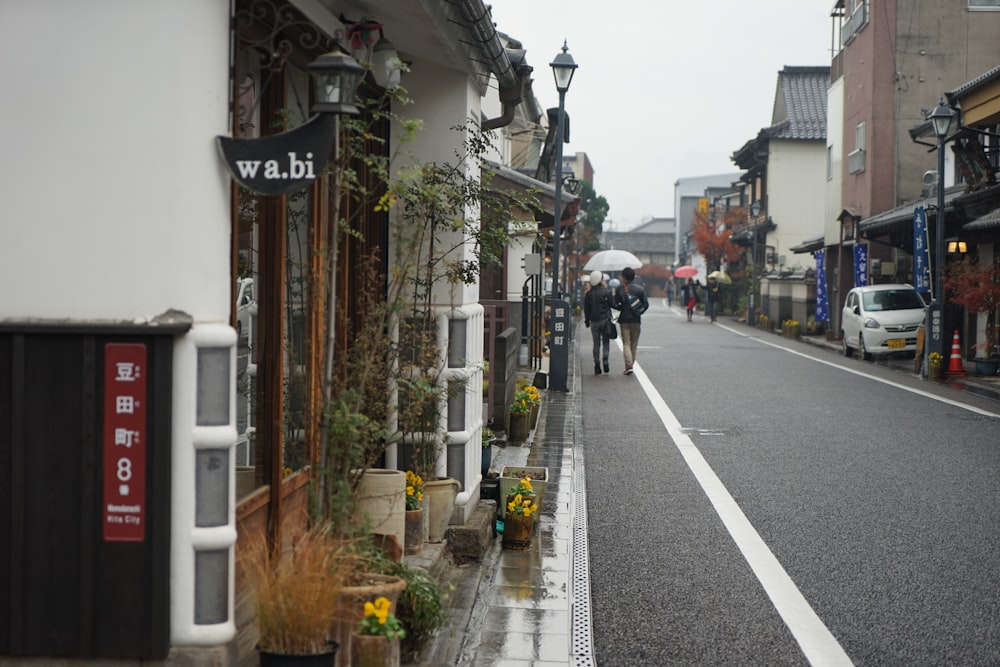 people walking down a street