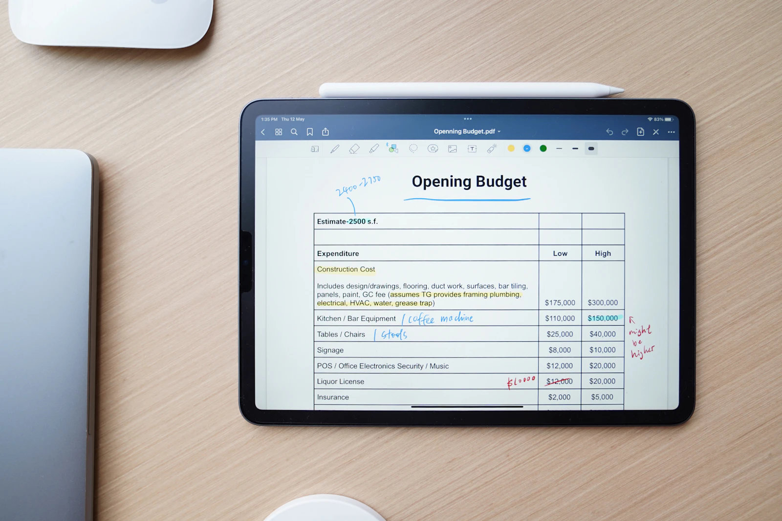 A financial report on a tablet at a clean, bright desk by a window