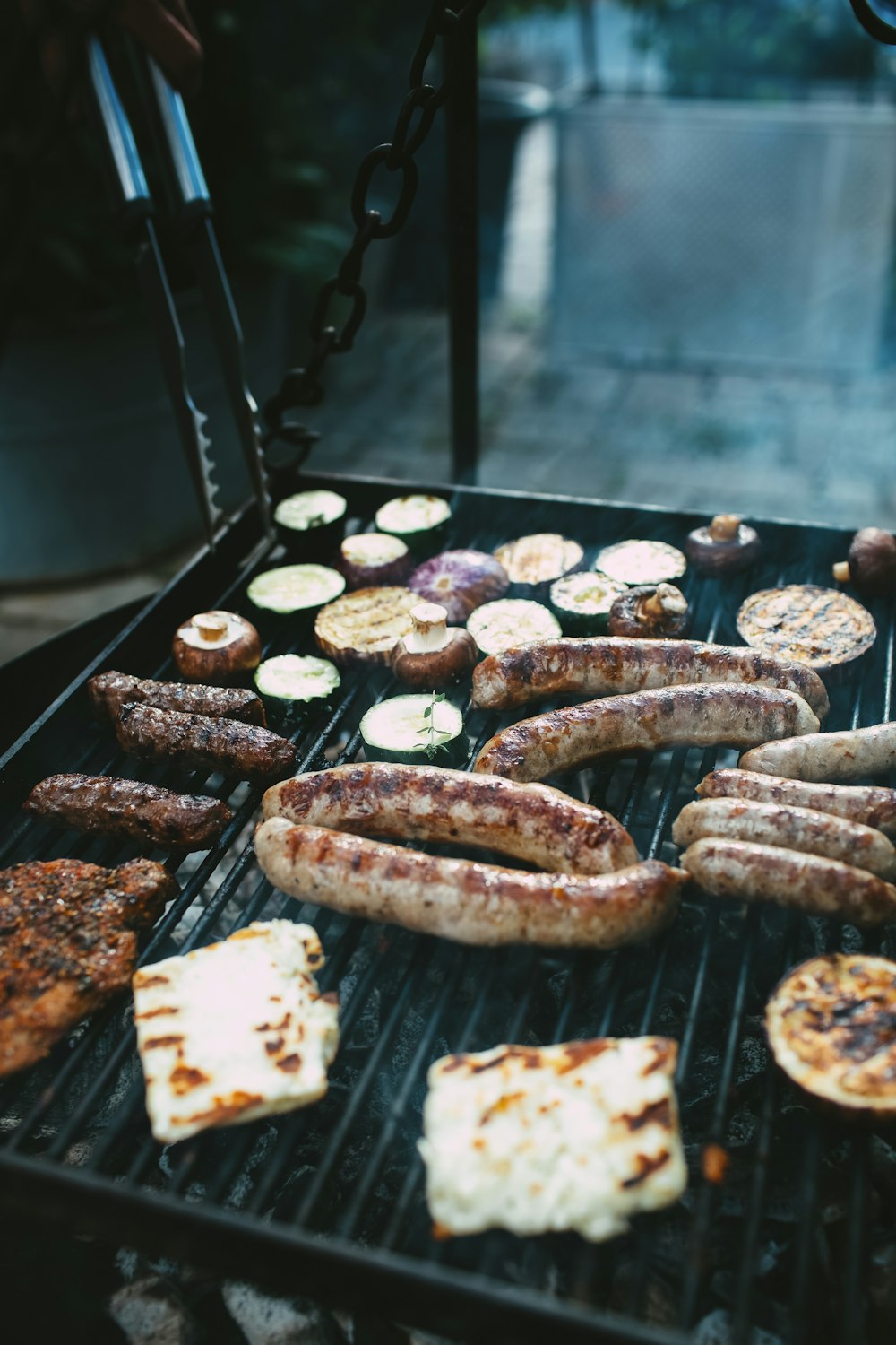 a grill with meat and cookies