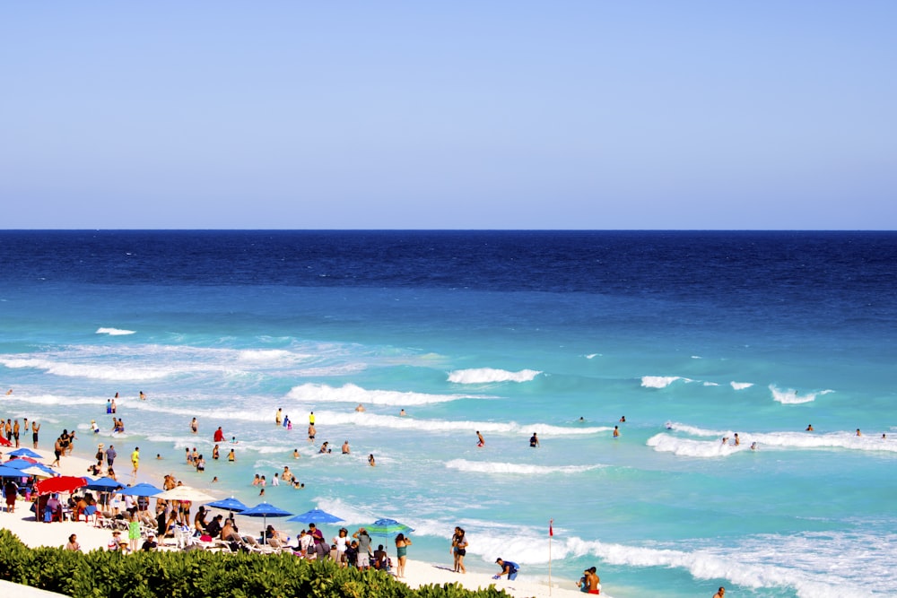 a crowded beach with people