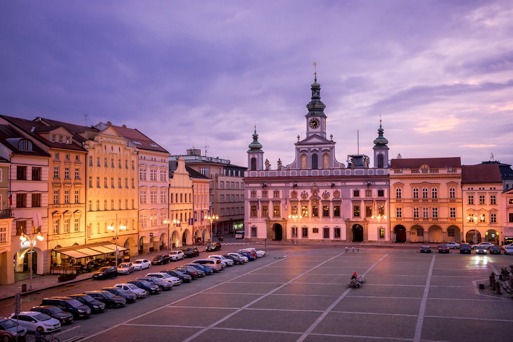 a large building with a parking lot in front of it