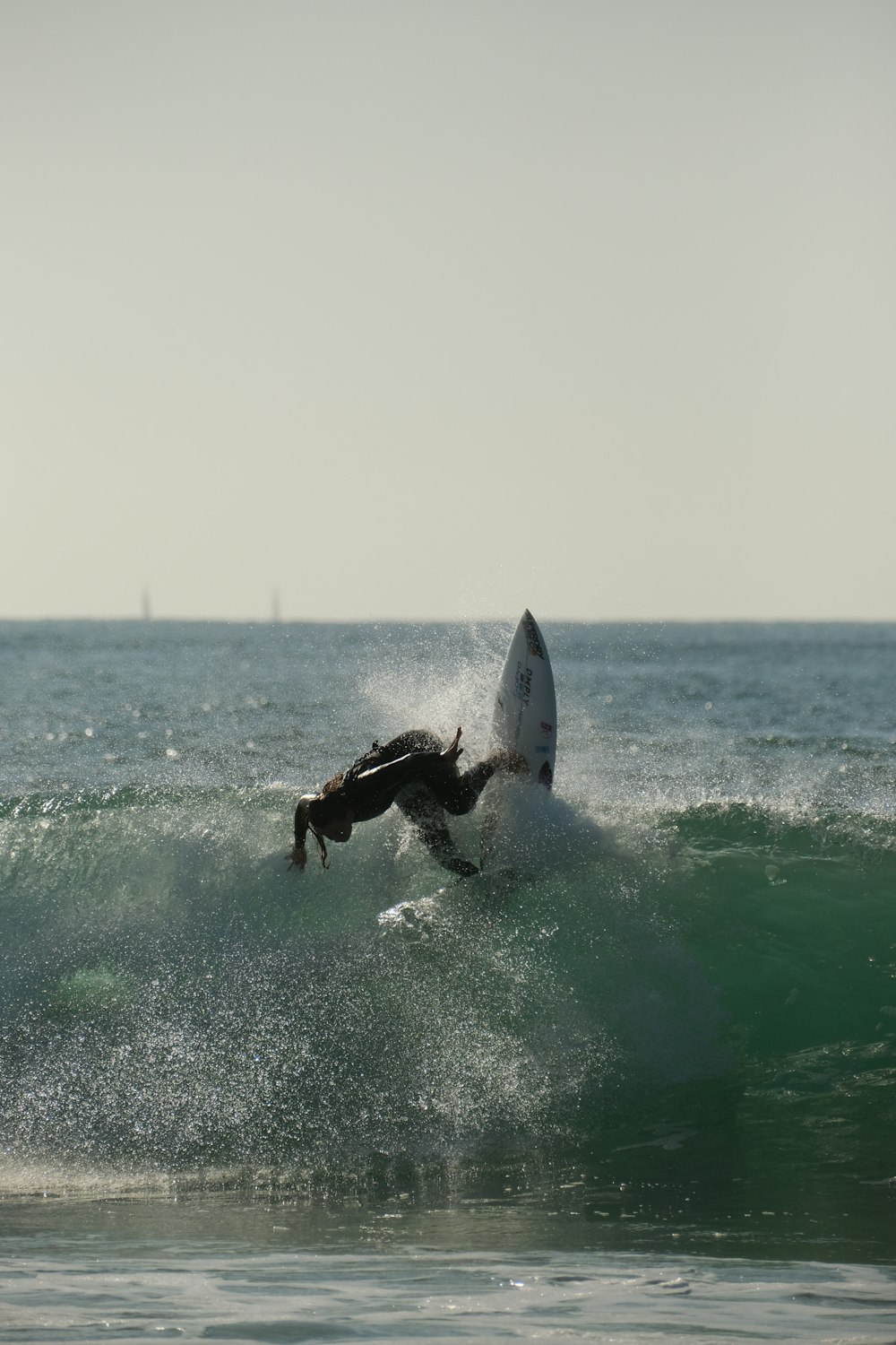 a man surfing on a wave