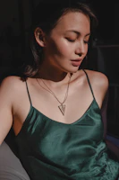 a woman with a tattoo on her neck