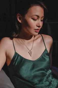 a woman with a tattoo on her neck