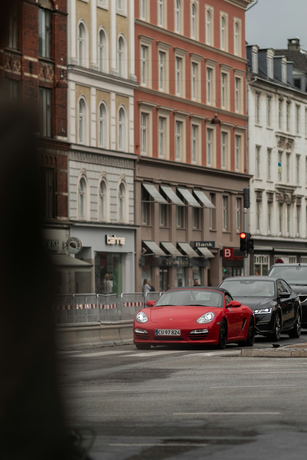 cars parked on the side of a street