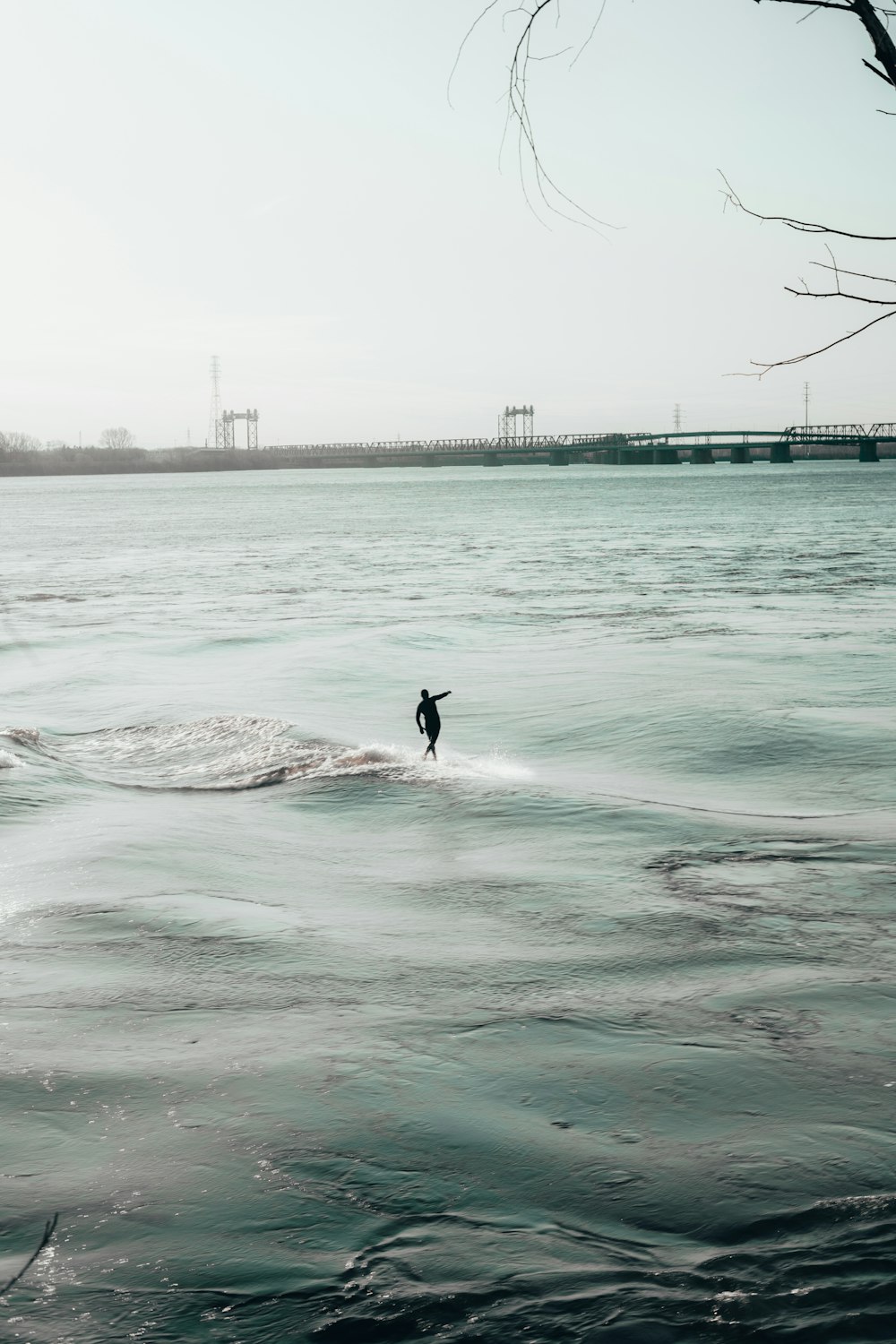 a person surfing in the sea