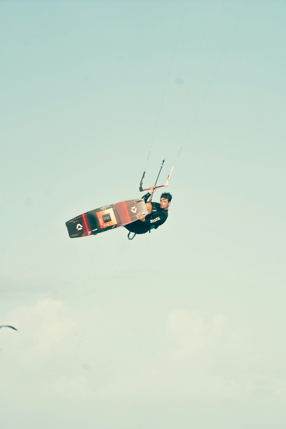 a person parachuting in the sky