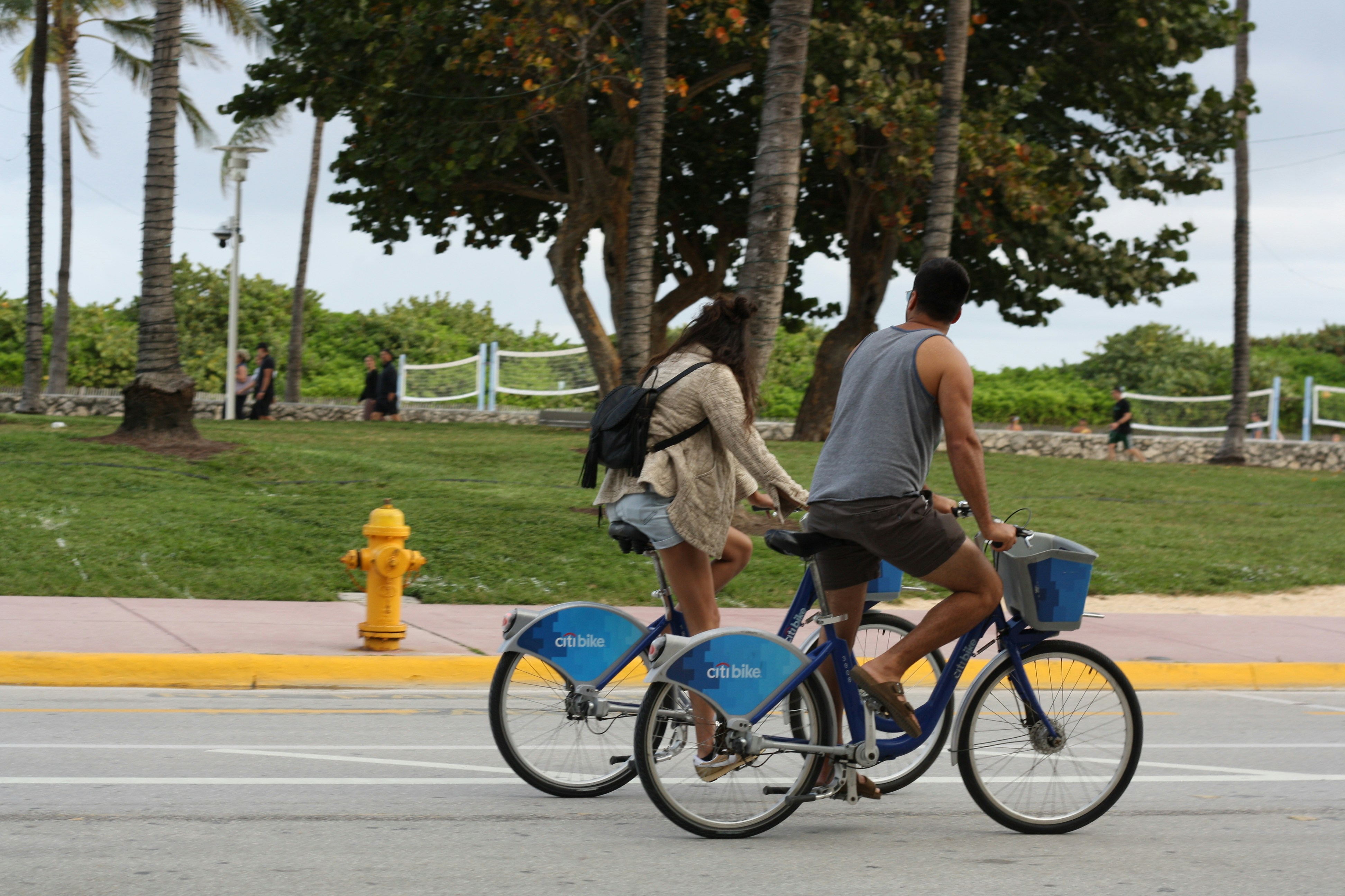 a couple riding bikes