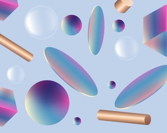 Various geometric shapes such as spheres, cylinders, and ellipses are floating against a light blue background. The objects feature a gradient of colors including blue, pink, and gold, giving them a metallic and reflective appearance.