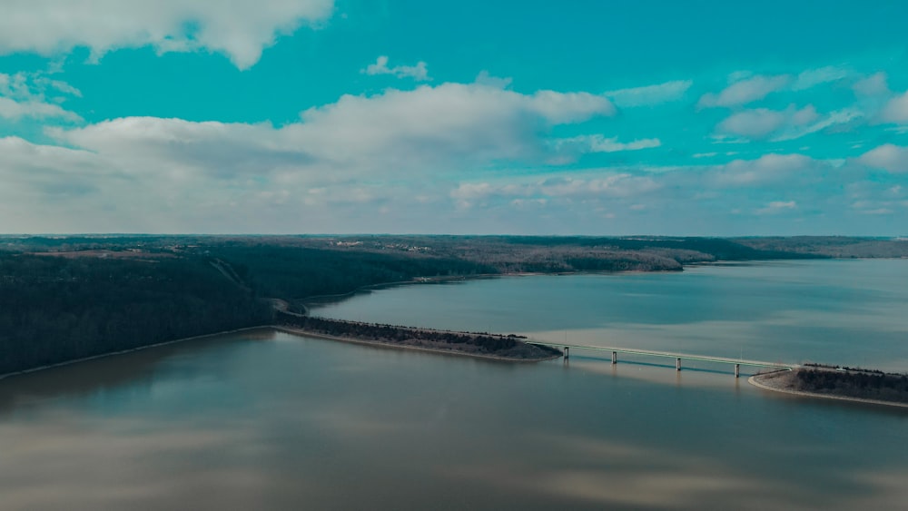 a body of water with land in the distance