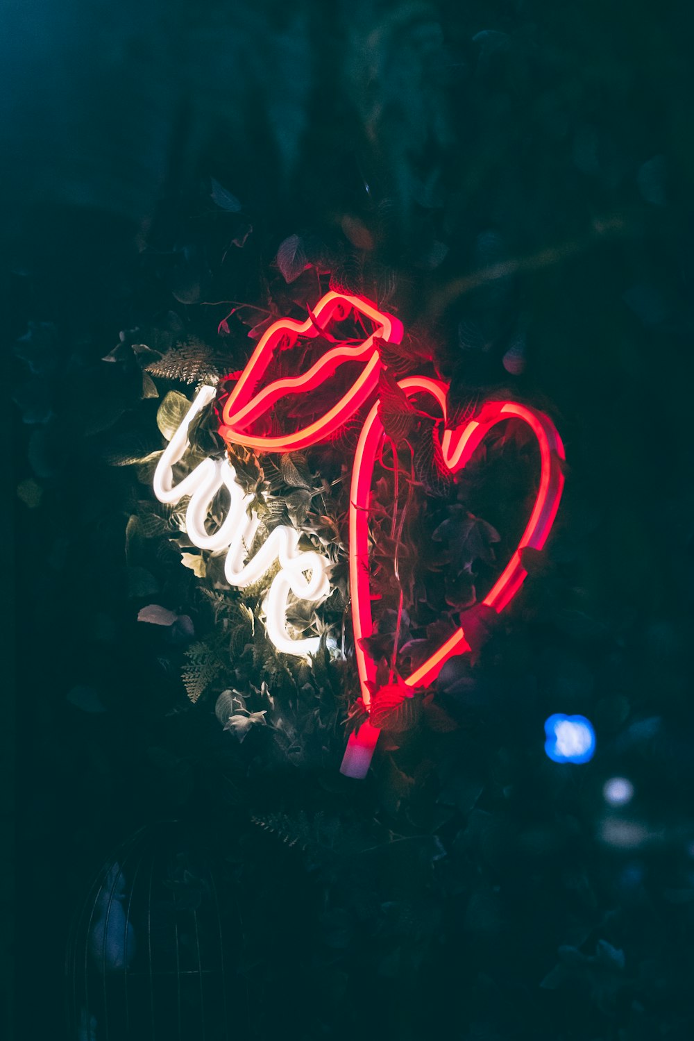 a heart made of red and white string