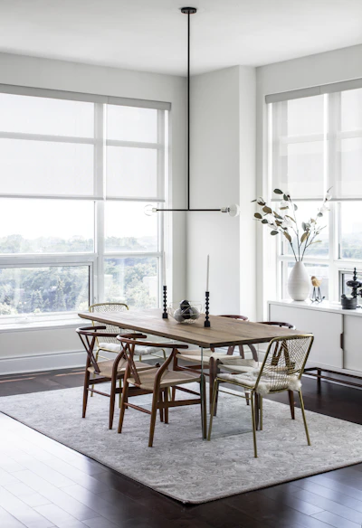 a dining room table with chairs