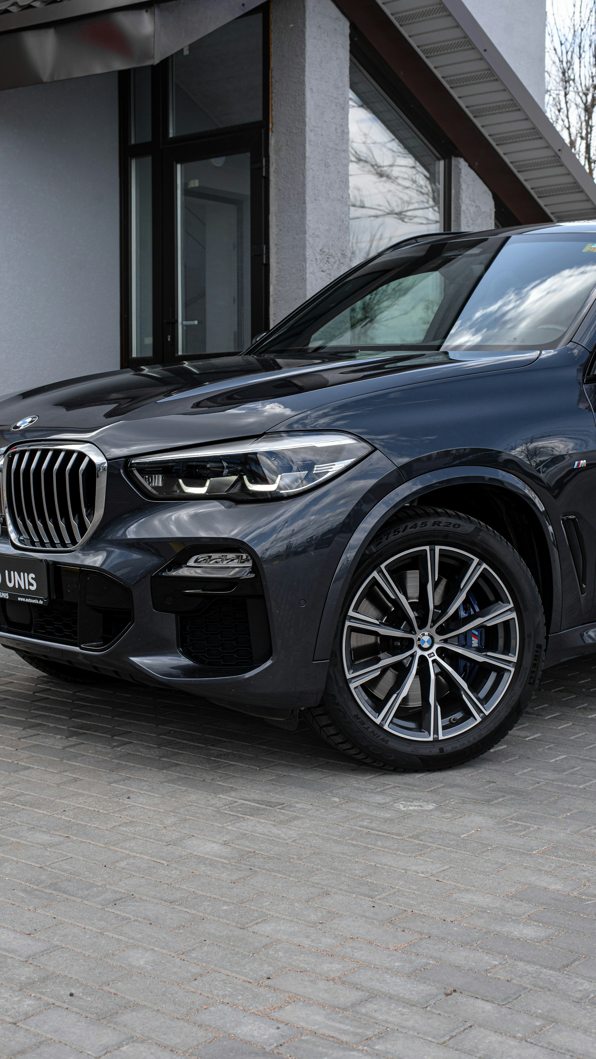 woman wearing yellow long-sleeved dress under white clouds and blue sky during daytime