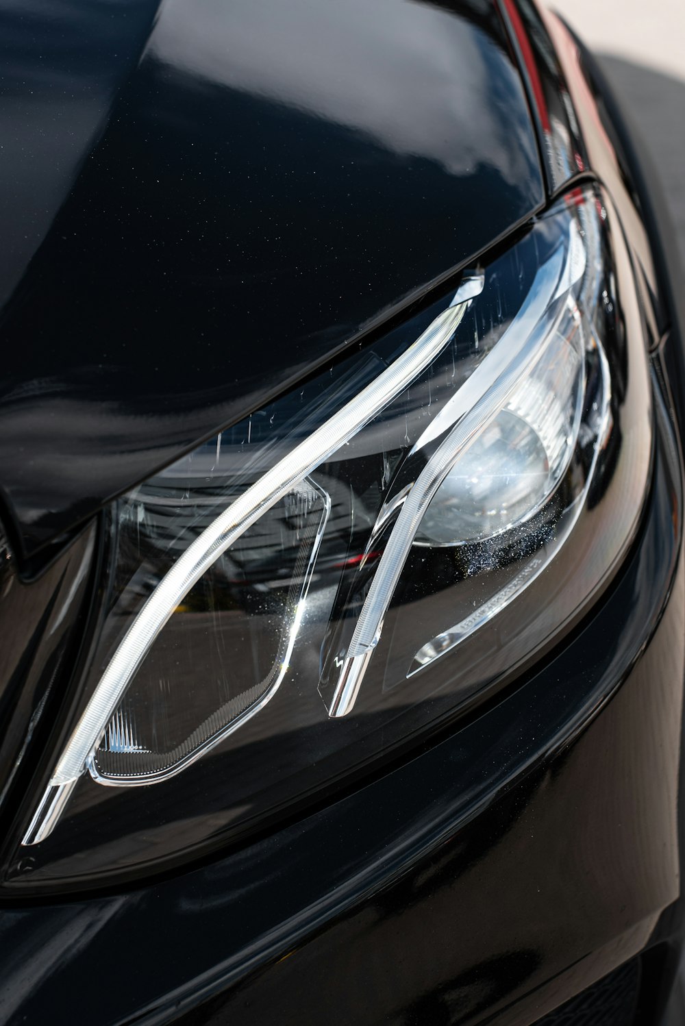 a close up of a car's headlight
