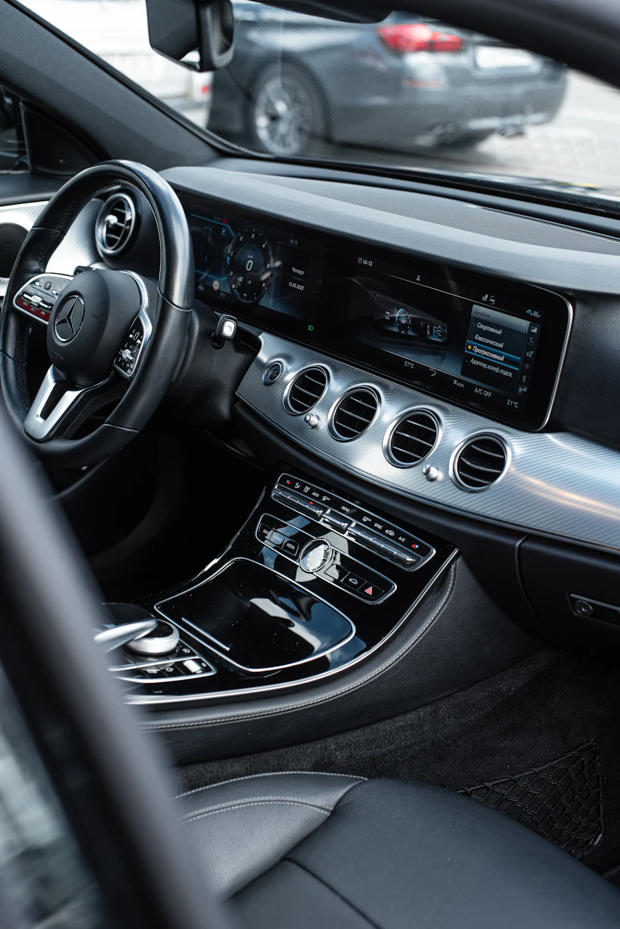 Clean modern Mercedes interior showing the dashboard and front seats
