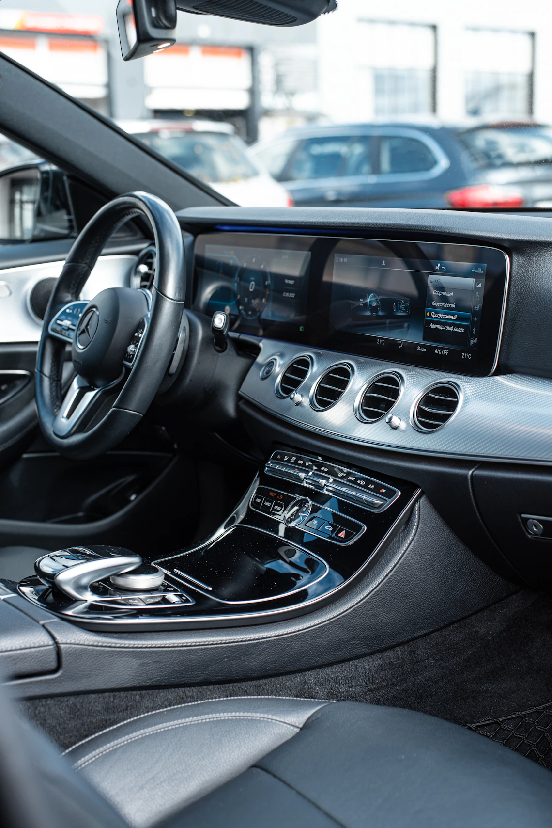 Premium modern car interior with steering wheel, dashboard and seating
