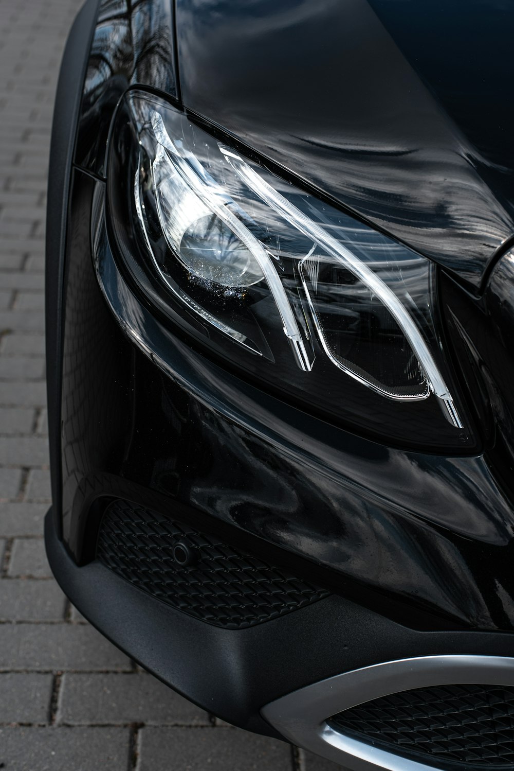 a black car with its front facing the camera