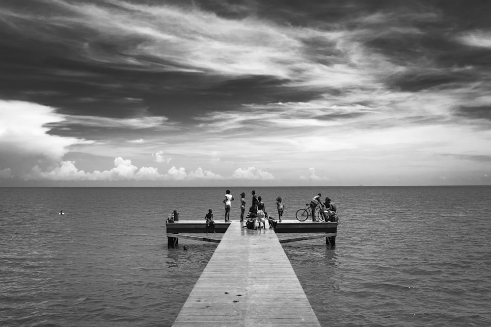 a group of people on a dock