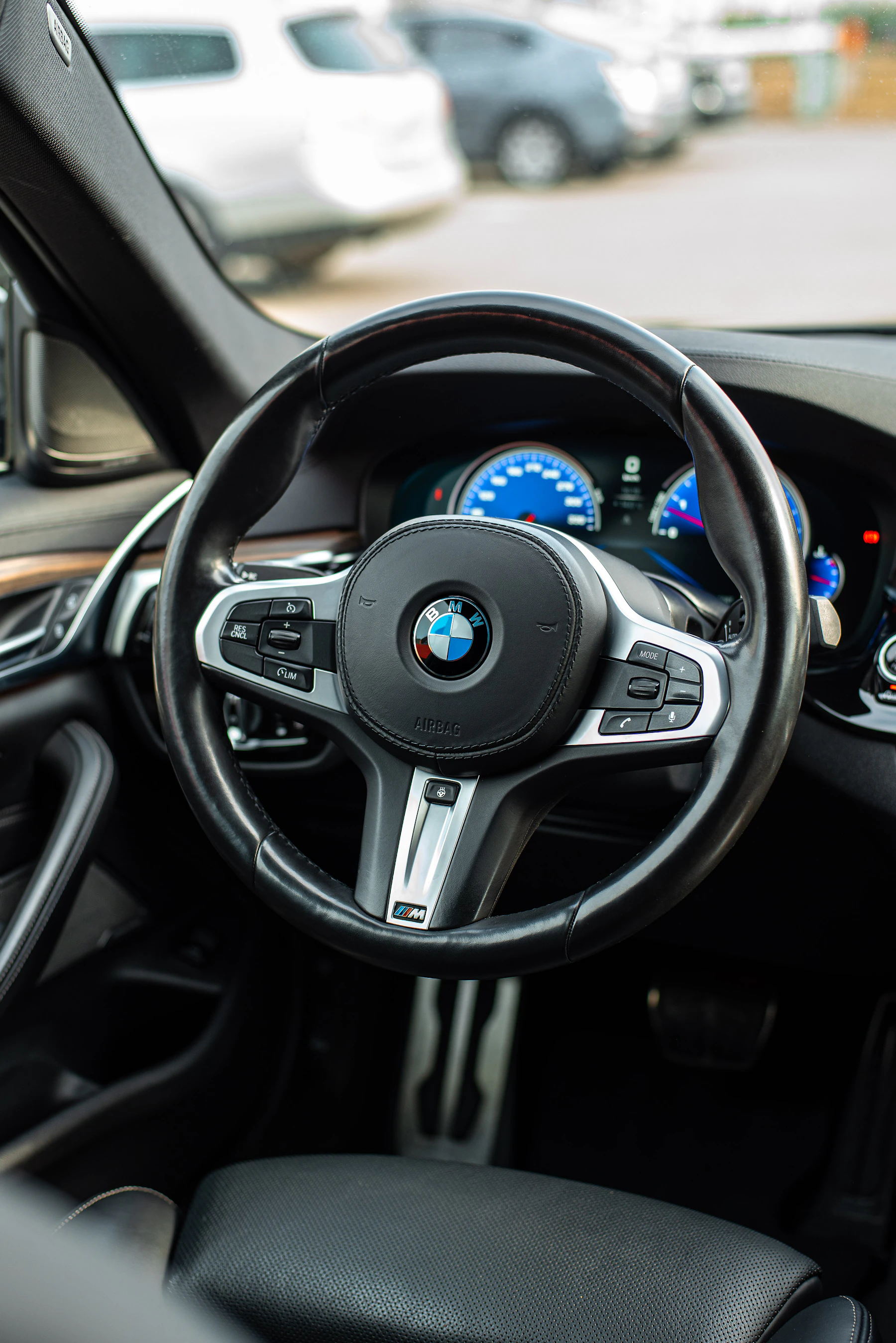 Clean steering wheel and dashboard inside a maintained vehicle cabin