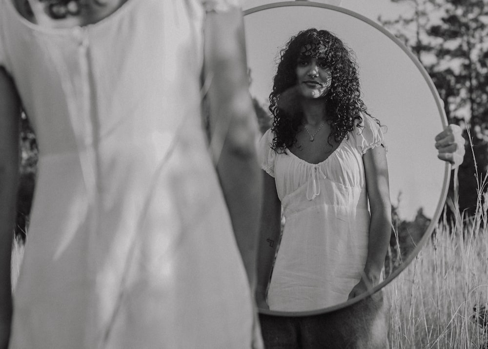 a person holding a white umbrella