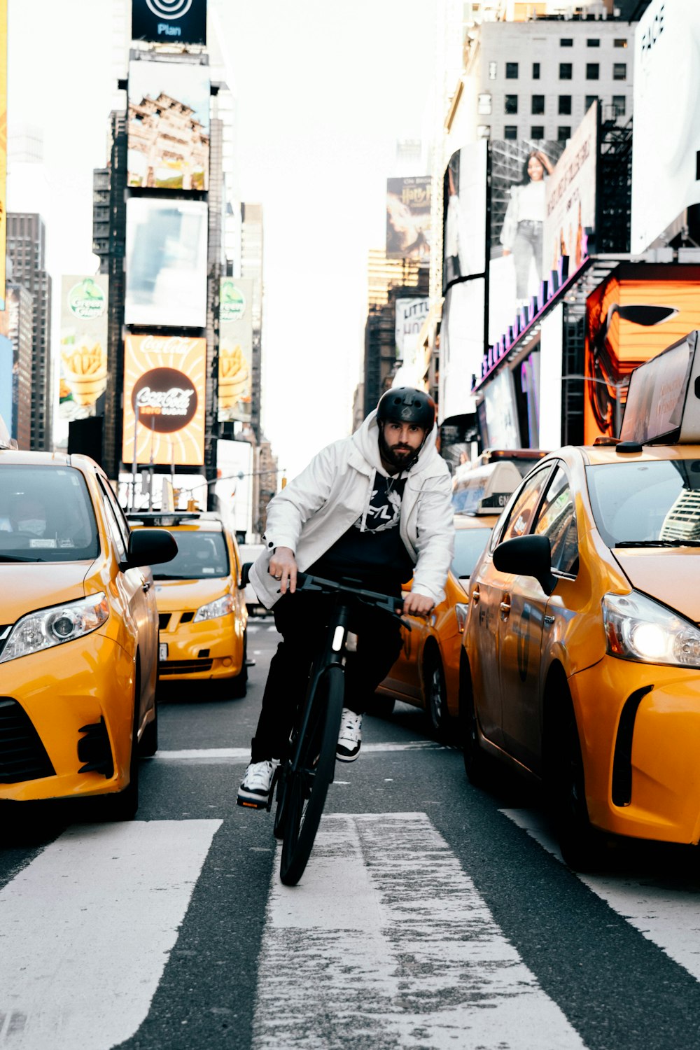 a person riding a scooter in a busy city