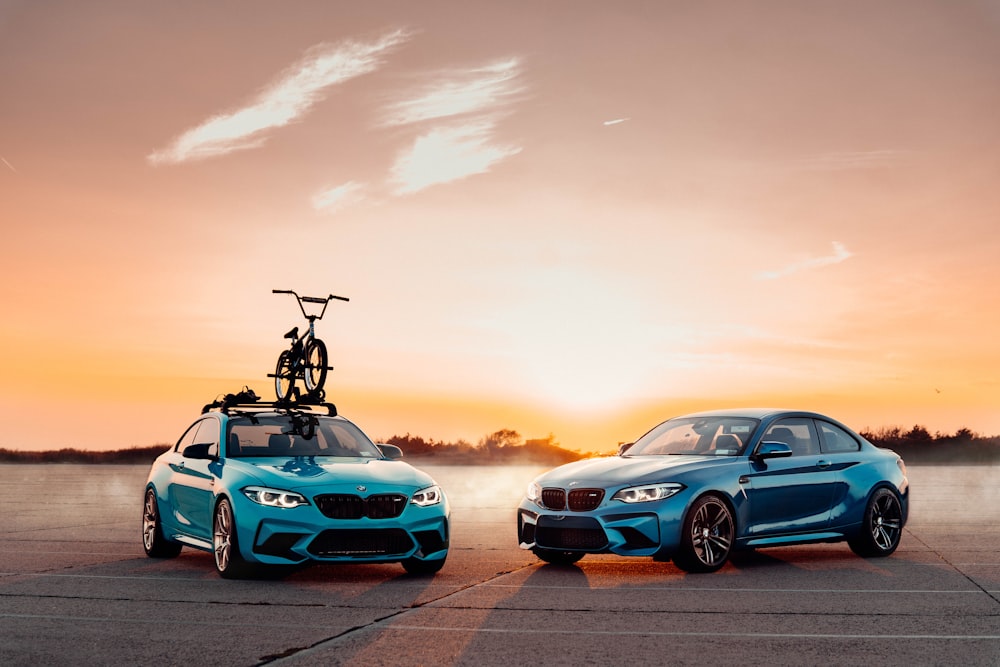 two cars parked on a road