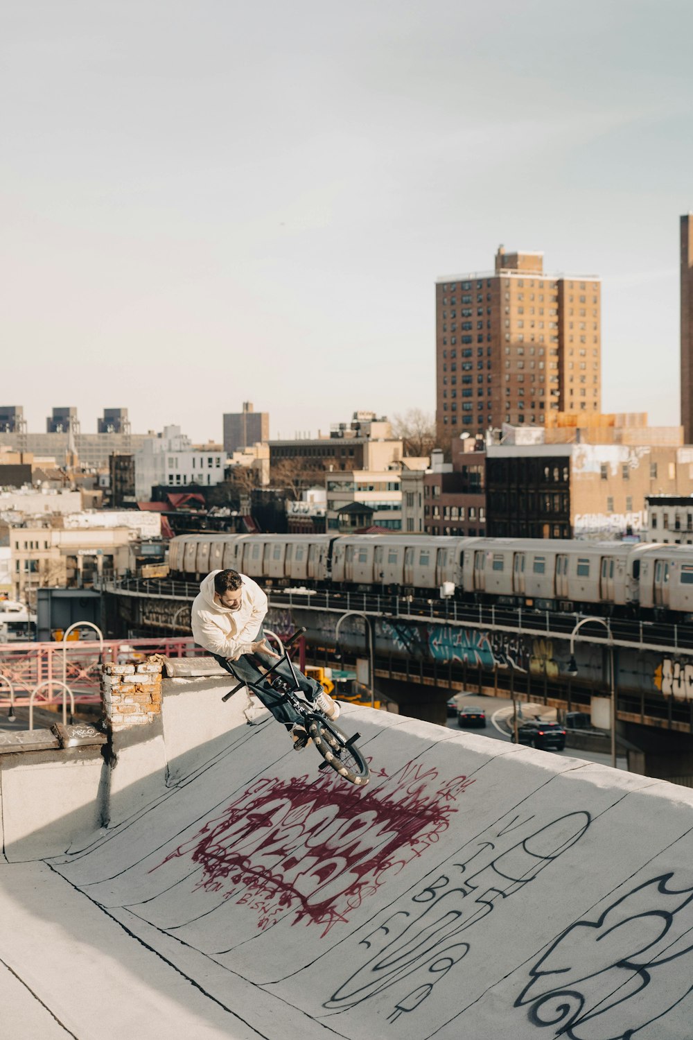 a person riding a bicycle on a roof