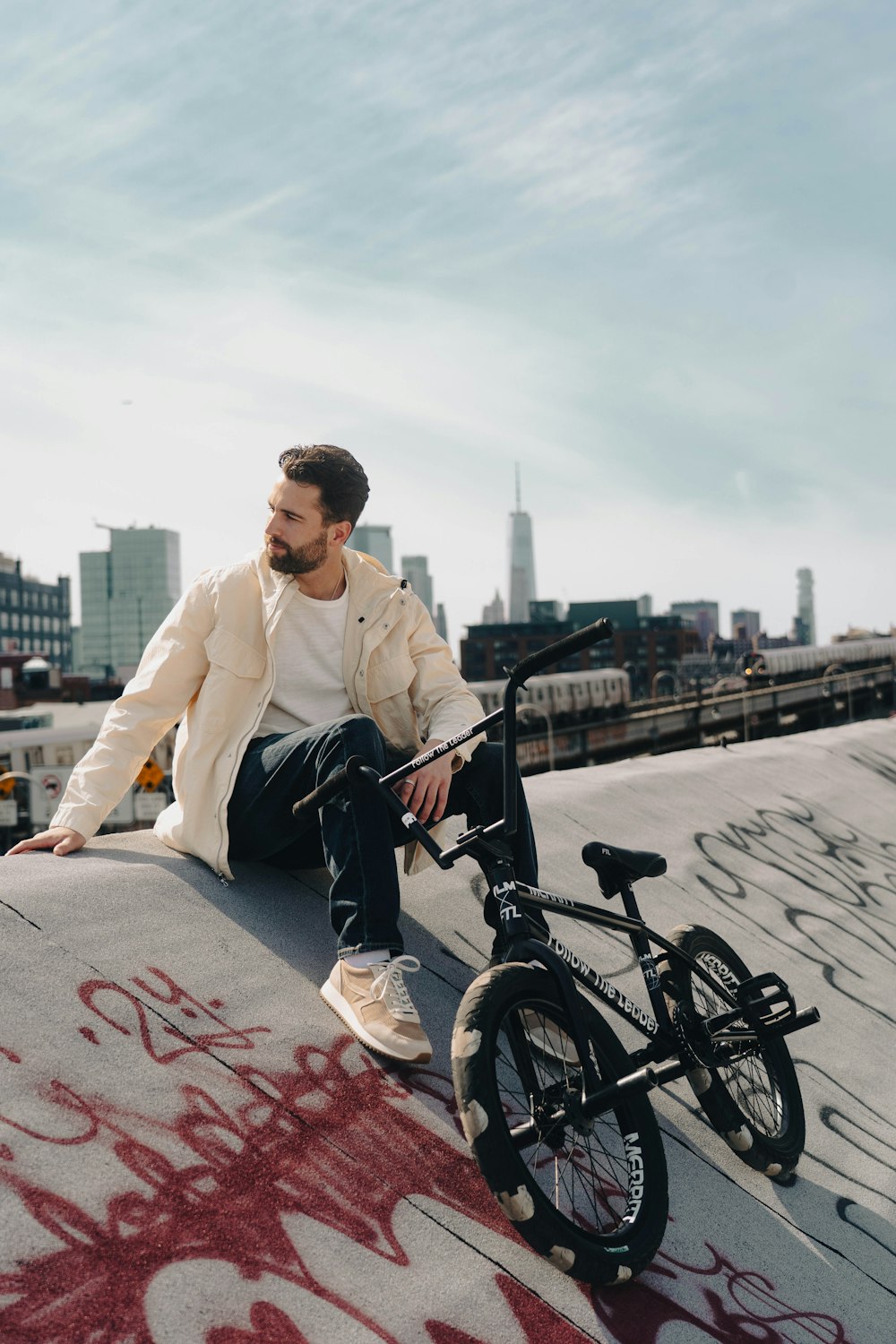 a man sitting on a bicycle