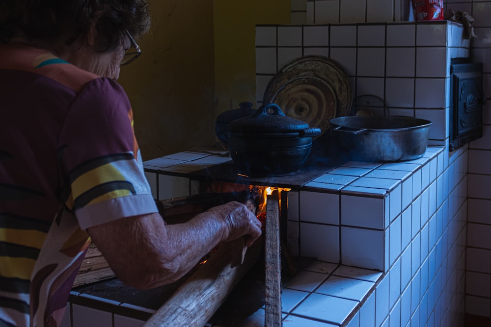 a person cooking in a kitchen
