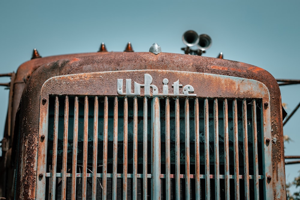 a metal grill with a sign on it