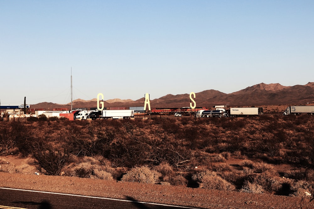 a group of trailers parked in a desert