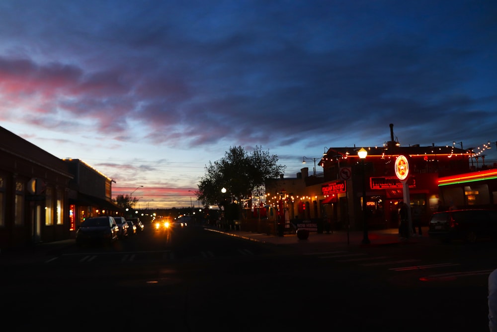 a street with buildings and cars