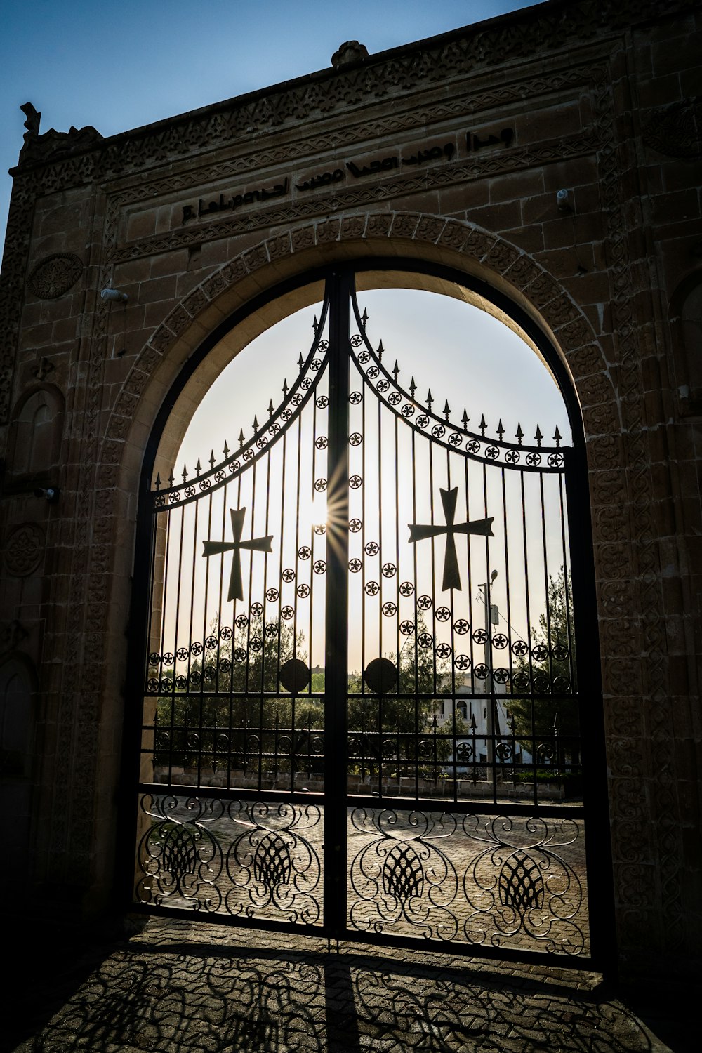 a gate in front of a building