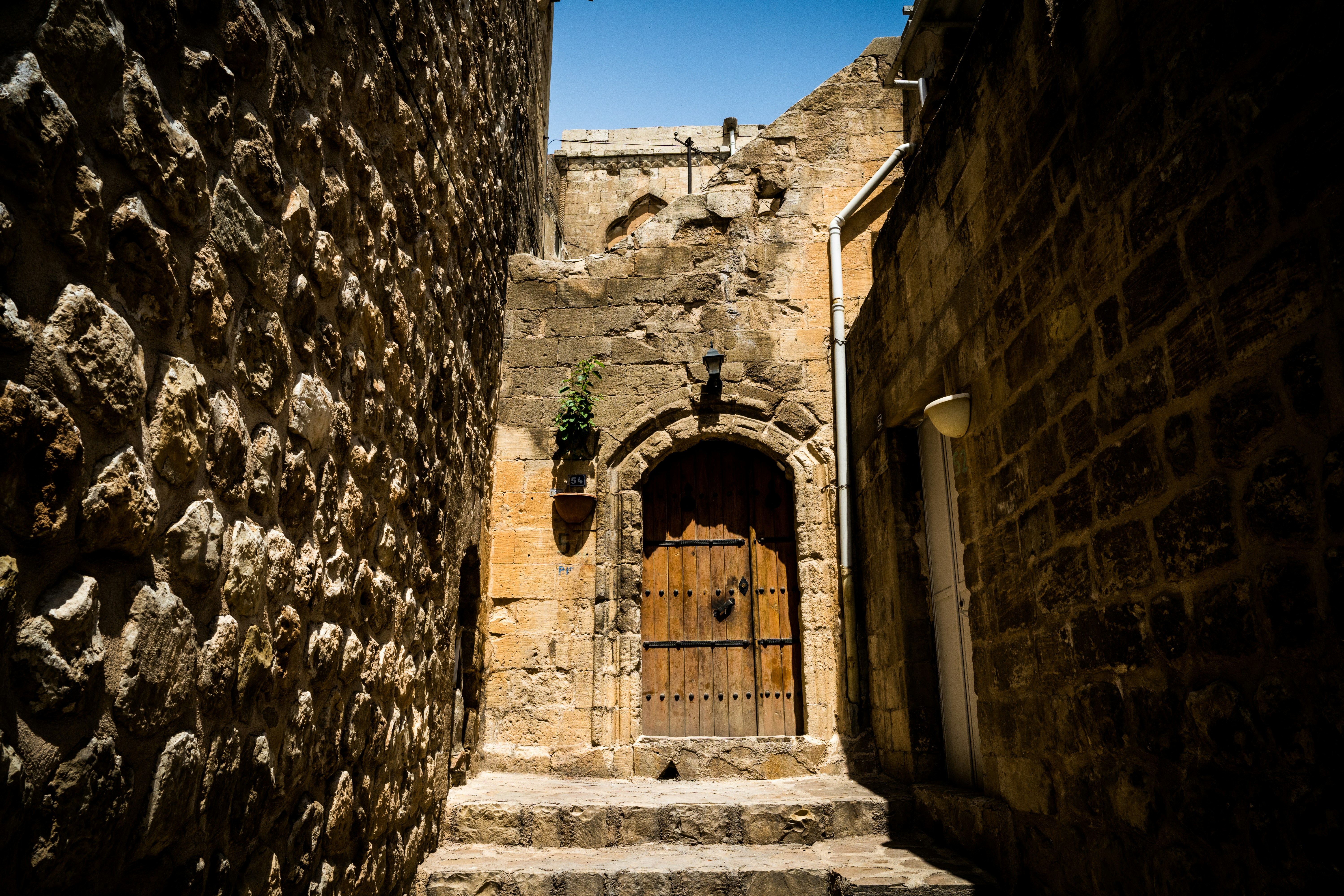 a stone building with a door