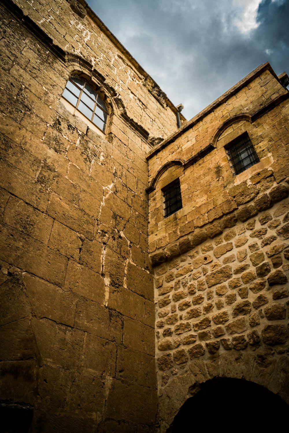 a stone building with windows