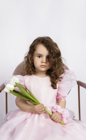 a girl in a dress shirt and tie